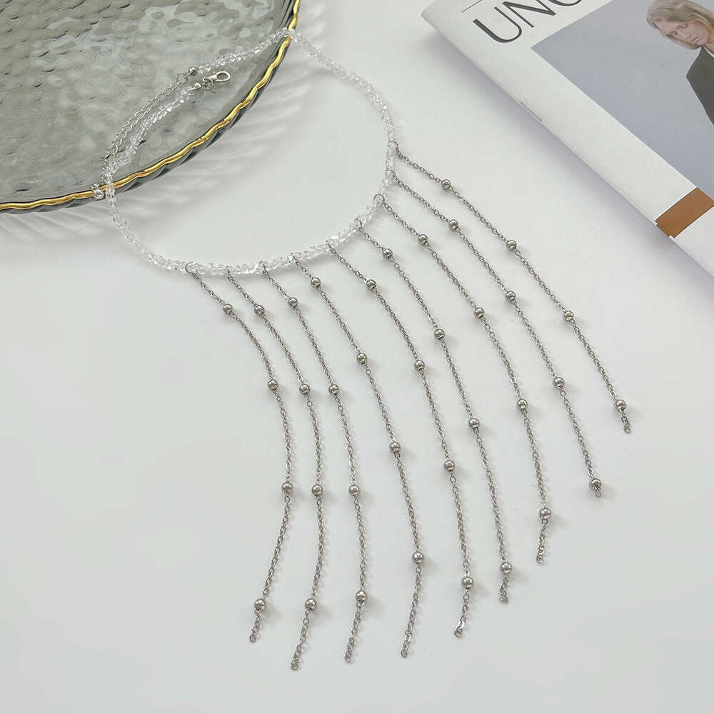 Layered Cross Pendant Necklace with Pearl Tassel Accents Modern Minimalist Collarbone Chain for Stackable Jewelry Looks