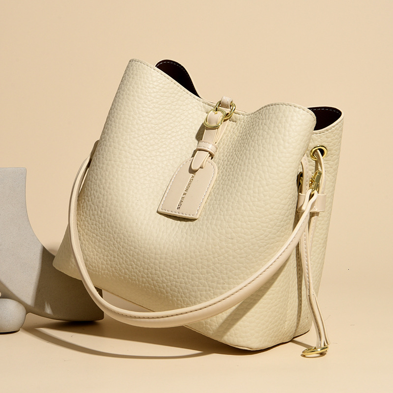 Free Shipping Designer Women's Bag New Fashion Multifunctional Large Capacity Crossbody Bag Simple Commuting Bucket Bag Handbag