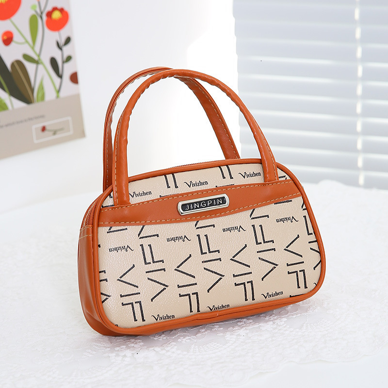 2025 New Outdoor Style Luxury Free Delivery Designer Bag Mom's New Handbag Elderly Phone Bag Middle Aged Handheld Bag