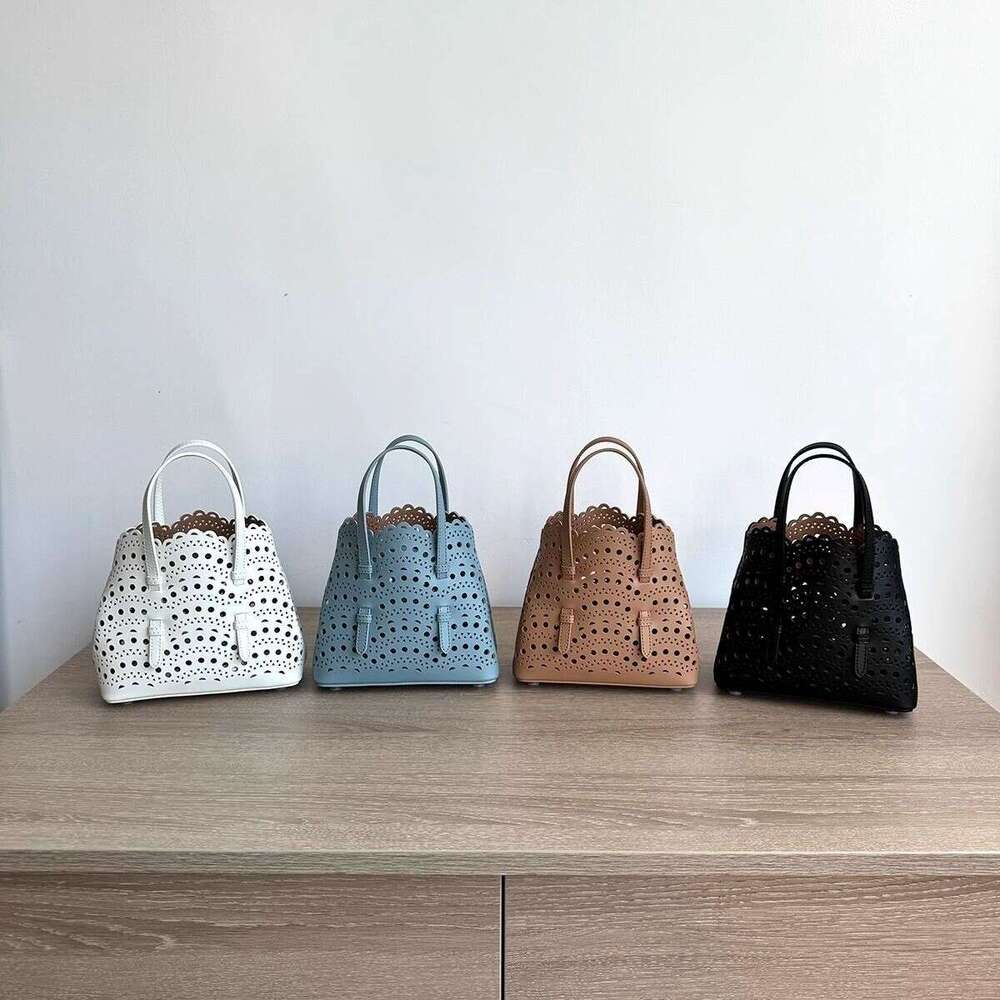 Niche carved pattern design genuine leather handbag hollowed out cowhide crossbody fashionable shoulder vegetable basket bag women's bag