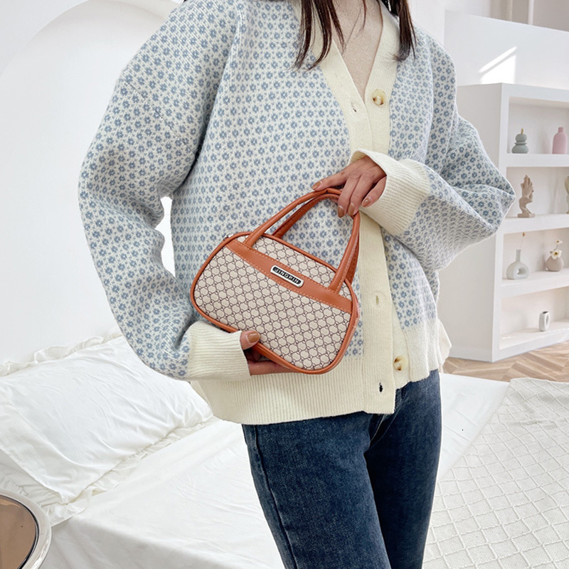 2025 New Outdoor Style Luxury Free Delivery Designer Bag Mom's New Handbag Elderly Phone Bag Middle Aged Handheld Bag