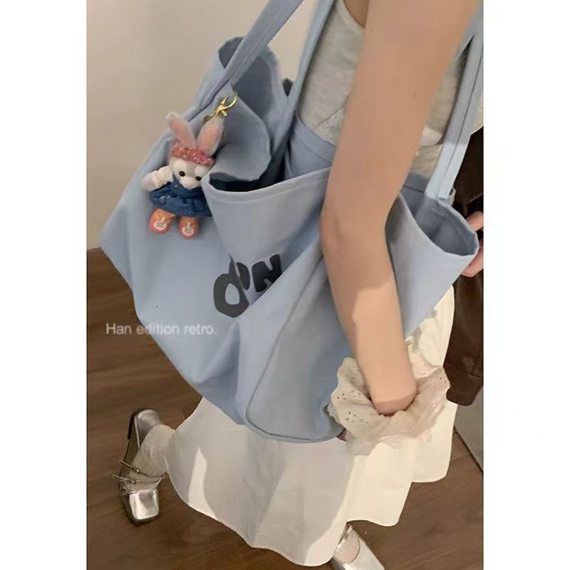 New canvas commuting multifunctional bag, large capacity outdoor tote bag, trend designer fashion women's crossbody bag, shoulder bag