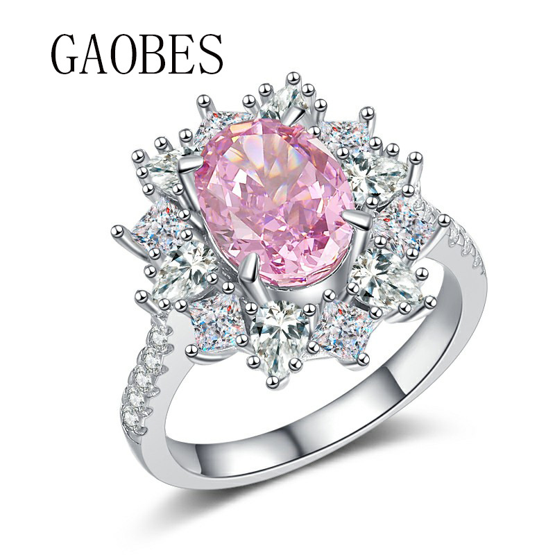Sophisticated Bridal Ring: Luxury Sterling Silver Piece Set With Eye-Catching Oval Gem