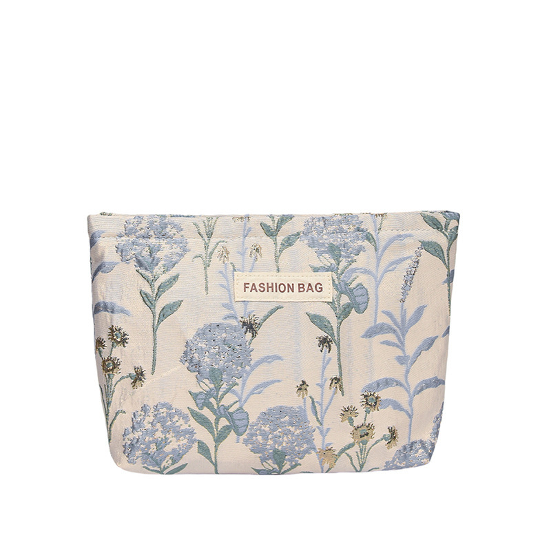 Small niche trend soft embossed portable travel storage toiletries large capacity canvas makeup bag designer crossbody bag shoulder bag