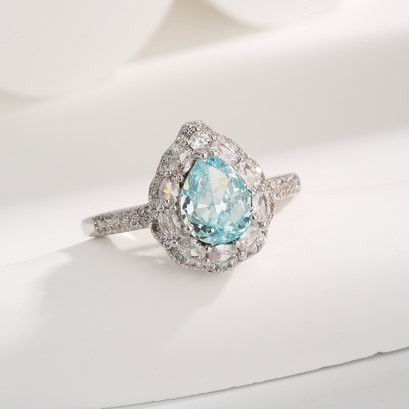 Luxury Pear-Shaped Gemstone Halo Ring with Diamonds, Available in Ruby, Emerald, Yellow Zirconia for Engagement or Special Occasions