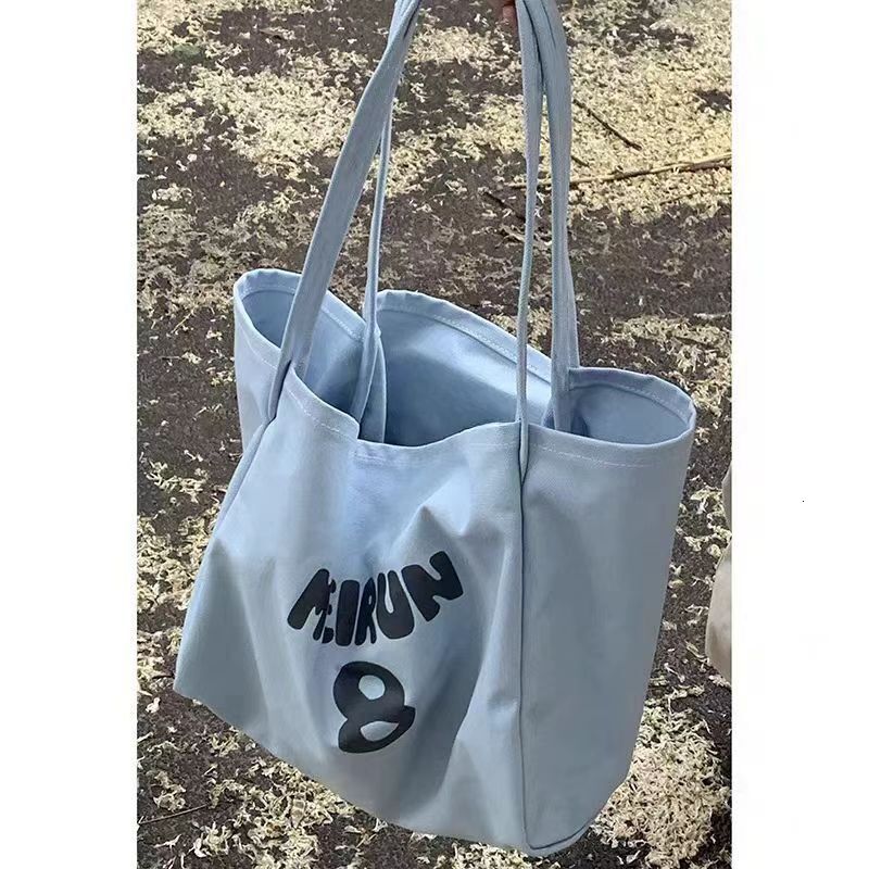 New canvas commuting multifunctional bag, large capacity outdoor tote bag, trend designer fashion women's crossbody bag, shoulder bag