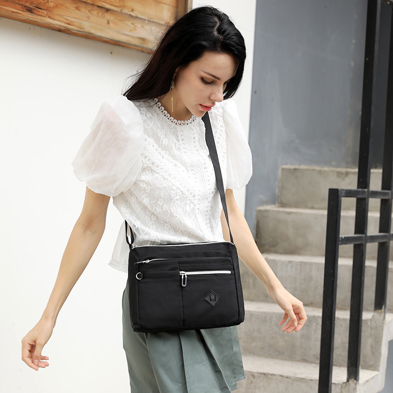 Colorful new fashionable and simple single shoulder women's crossbody bag designer, trend large capacity multifunctional splash proof backpack