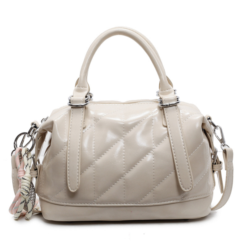 New spring trend and summer simple diamond mesh women's handheld bag, fashionable commuting pillow, multifunctional one-piece bag, designer cross