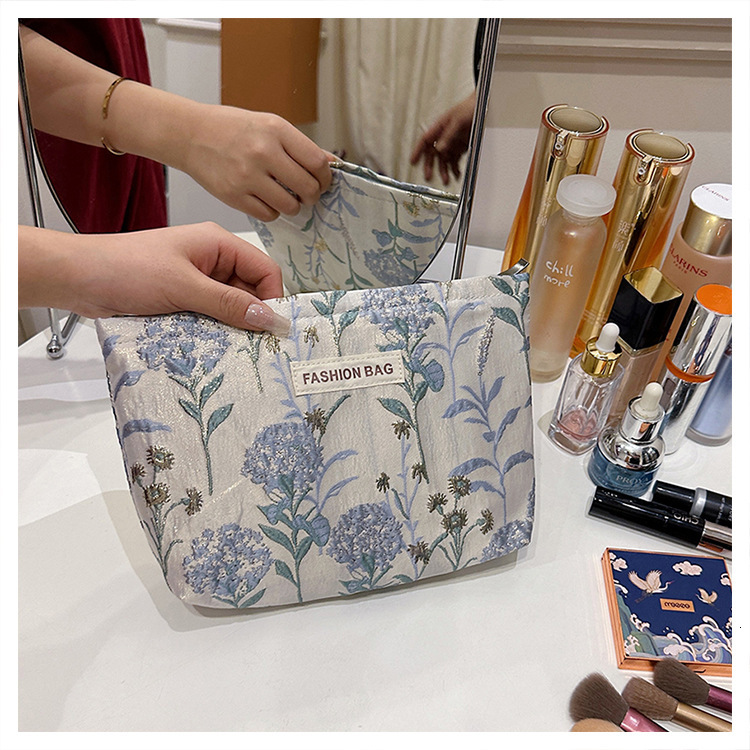 Small niche trend soft embossed portable travel storage toiletries large capacity canvas makeup bag designer crossbody bag shoulder bag
