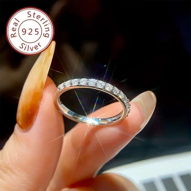 One Shavano Sterling Sier Featuring Round Cut Moissanite with Gold Plated Coating It Is an Elegant Simple Stackable Ring Suitable Women And Makes a