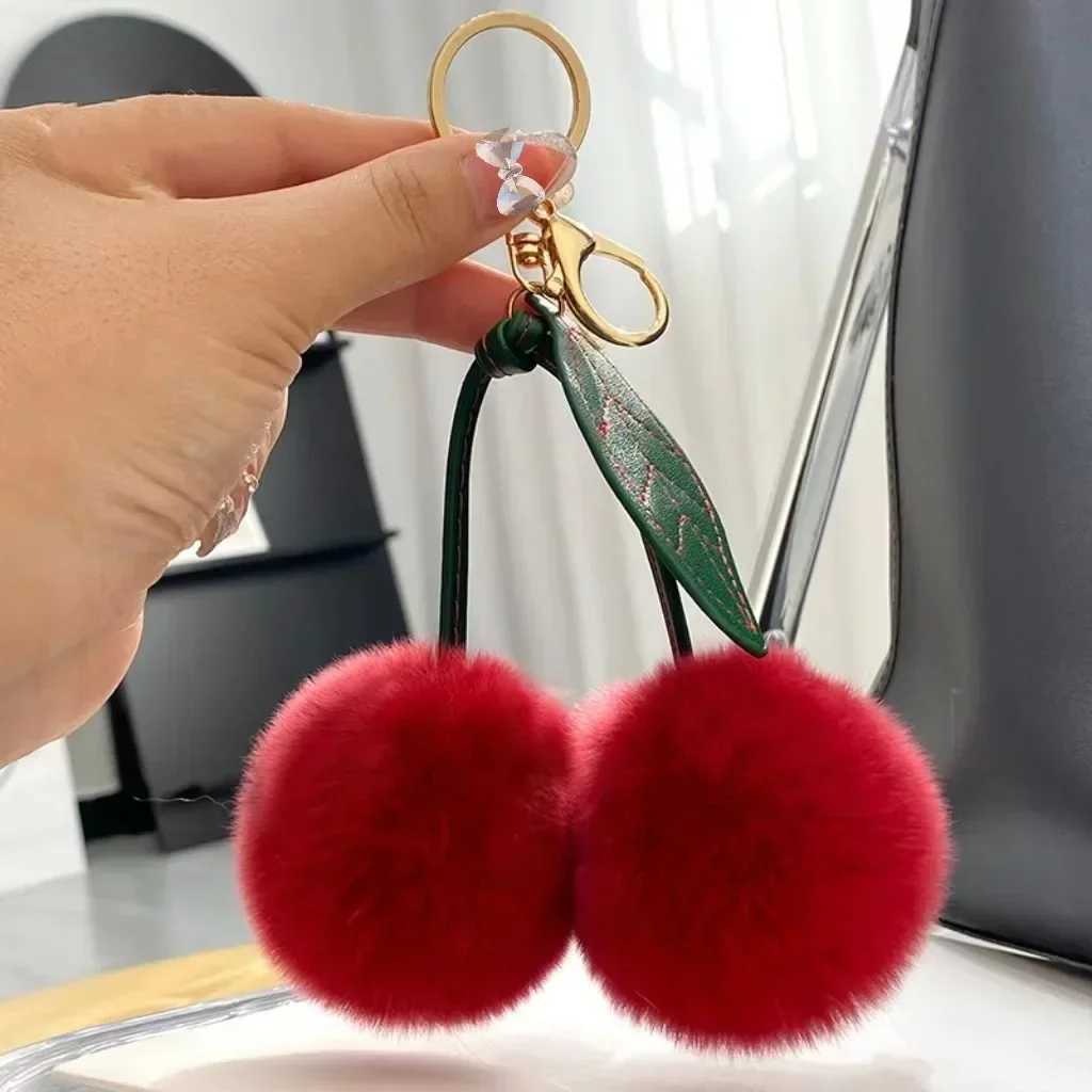 Real Otter Rabbit Hair Cherry Car Keychain Pendant Net Red INS Cute Plush Ball Bag Pendant Birthday Gift Schoolbag Travel W250526