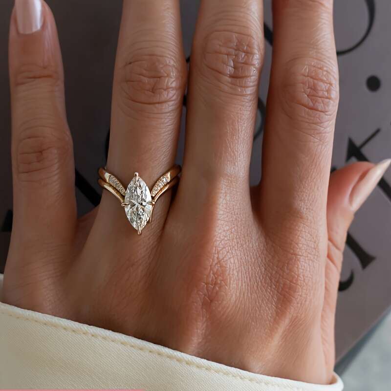 A two piece set of minimalist INS style S sterling Siery rings featuring oval Moissanite stone perfect for a unique and fashionable look