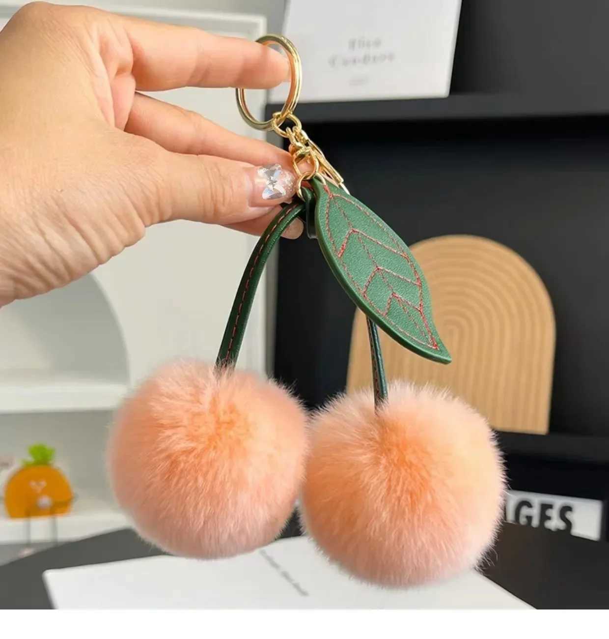Real Otter Rabbit Hair Cherry Car Keychain Pendant Net Red INS Cute Plush Ball Bag Pendant Birthday Gift Schoolbag Travel W250526