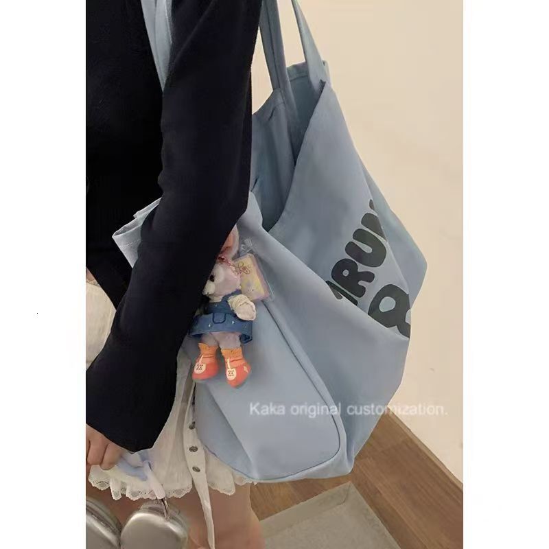 New canvas commuting multifunctional bag, large capacity outdoor tote bag, trend designer fashion women's crossbody bag, shoulder bag
