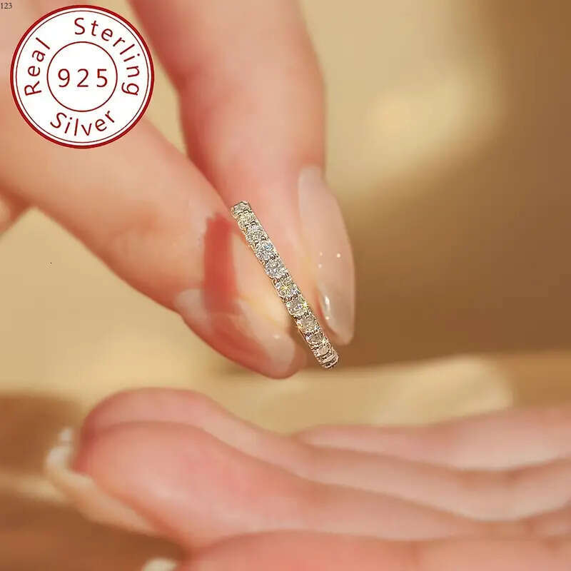 One Shavano Sterling Sier Featuring Round Cut Moissanite with Gold Plated Coating It Is an Elegant Simple Stackable Ring Suitable Women And Makes a