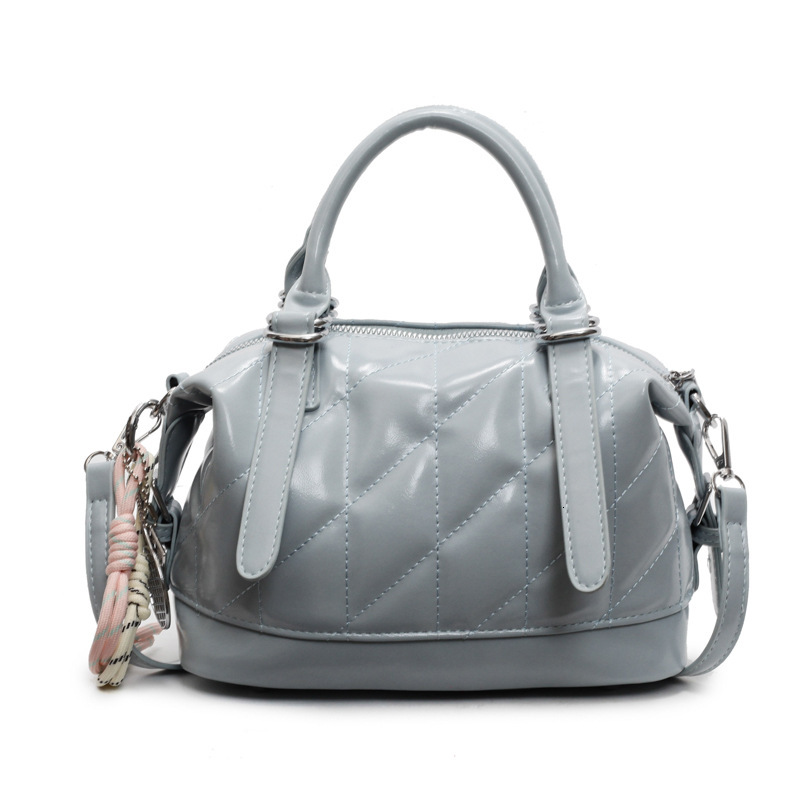 New spring trend and summer simple diamond mesh women's handheld bag, fashionable commuting pillow, multifunctional one-piece bag, designer cross