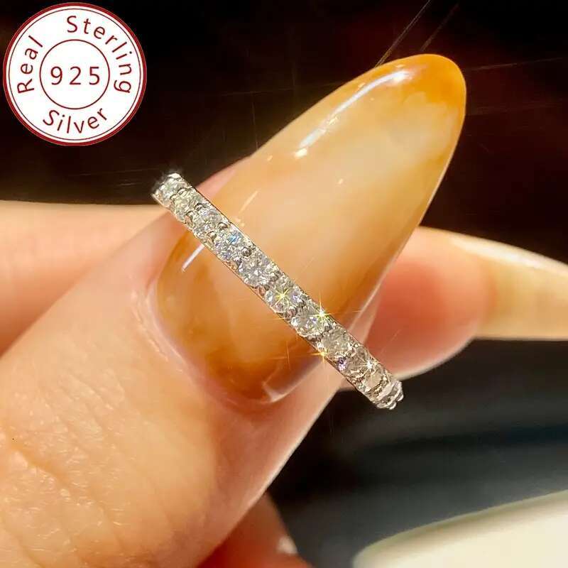 One Shavano Sterling Sier Featuring Round Cut Moissanite with Gold Plated Coating It Is an Elegant Simple Stackable Ring Suitable Women And Makes a
