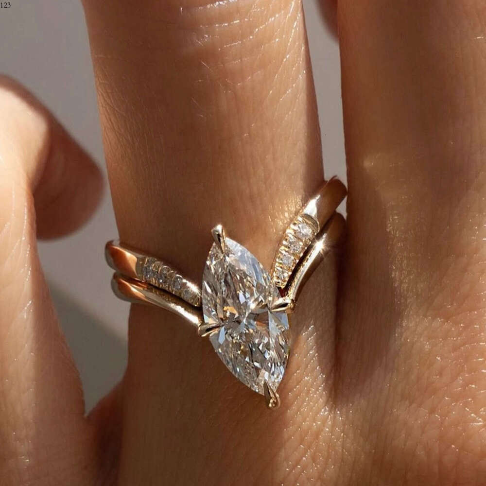 A two piece set of minimalist INS style S sterling Siery rings featuring oval Moissanite stone perfect for a unique and fashionable look
