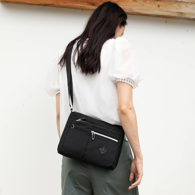 Colorful new fashionable and simple single shoulder women's crossbody bag designer, trend large capacity multifunctional splash proof backpack