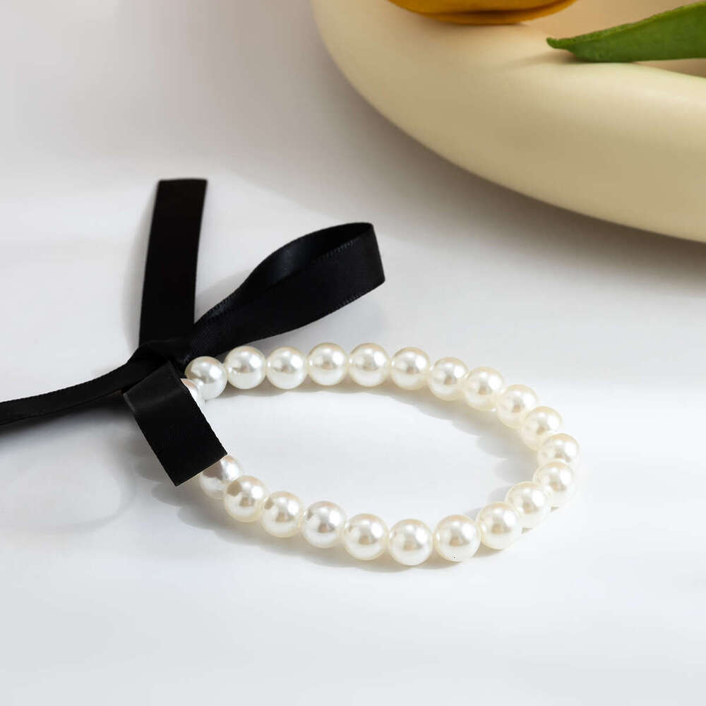Fashionable and Temperamental Artificial Pearl Bow knot Tying Necklace Jewelry Long Bow Collar Chain Neck chain Tied Pearl Necklace for Women