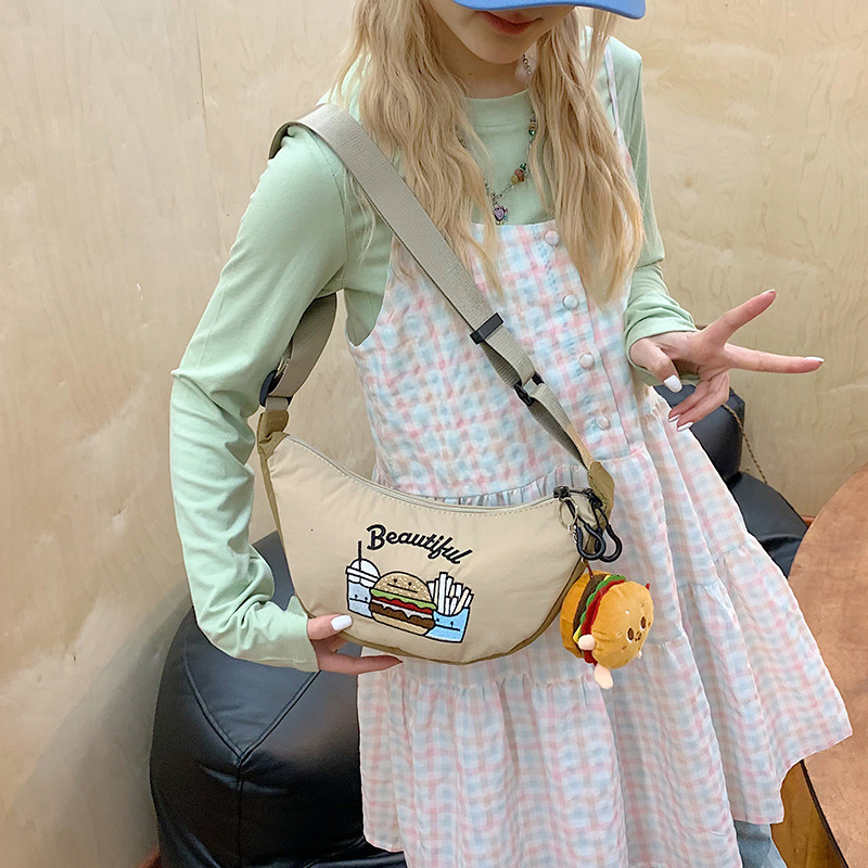 New diagonal fashion women s cartoon printed shoulder fashion Oxford fabric lightweight bicycle bag designer fashion shoulder bag crossbody bag