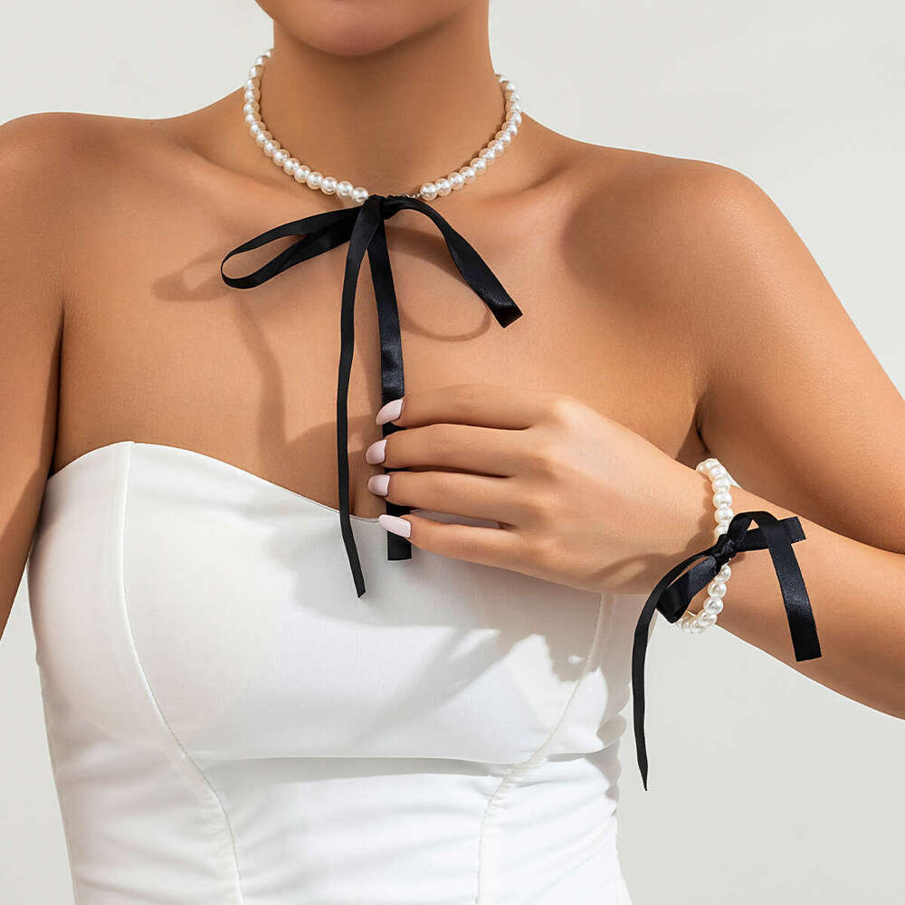 Fashionable and Temperamental Artificial Pearl Bow knot Tying Necklace Jewelry Long Bow Collar Chain Neck chain Tied Pearl Necklace for Women