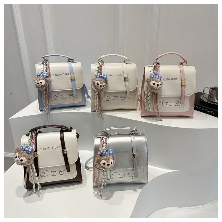 New trend Popular Spring Handheld Travel Backpack Pendant Cute Fashion Handbag Designer Women's Fashion Crossbody Bag Shoulder Bag
