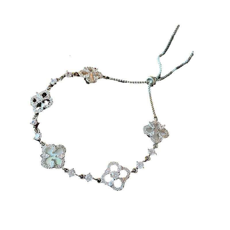 designer bracelet 2025 Lucky Four-Leaf Flower Shell Zircon Pull Bracelet for Women Exquisite Light Socialite Jewelrywith gift box