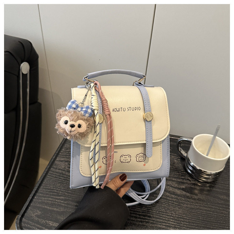 New trend Popular Spring Handheld Travel Backpack Pendant Cute Fashion Handbag Designer Women's Fashion Crossbody Bag Shoulder Bag