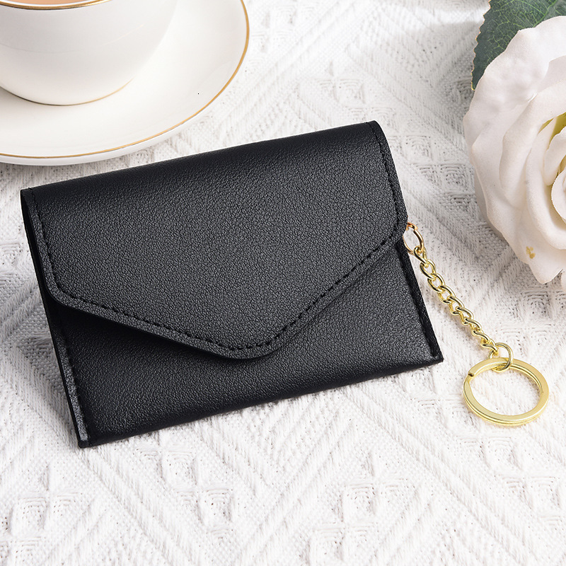 2025 Fashion new mini ultra thin women s public transportation keychain driver s license exchange bank card holder bag designer men s keychain bag
