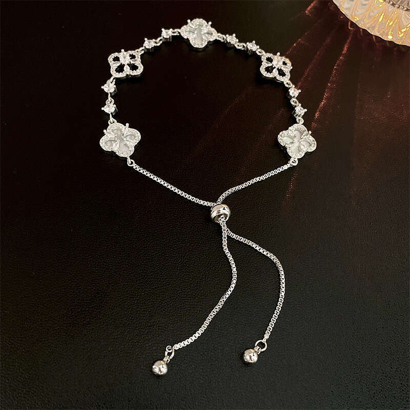 designer bracelet 2025 Lucky Four-Leaf Flower Shell Zircon Pull Bracelet for Women Exquisite Light Socialite Jewelrywith gift box