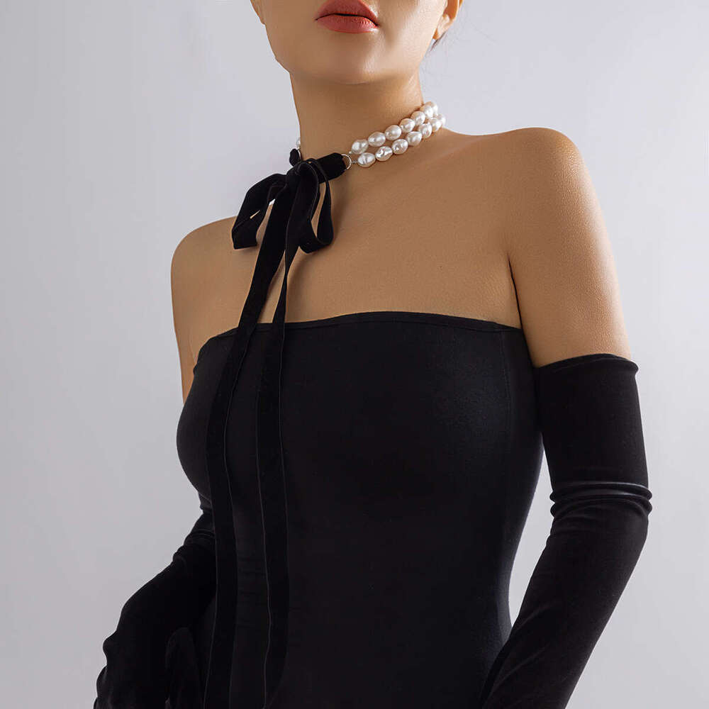 Fashionable and Temperamental Artificial Pearl Bow knot Tying Necklace Jewelry Long Bow Collar Chain Neck chain Tied Pearl Necklace for Women