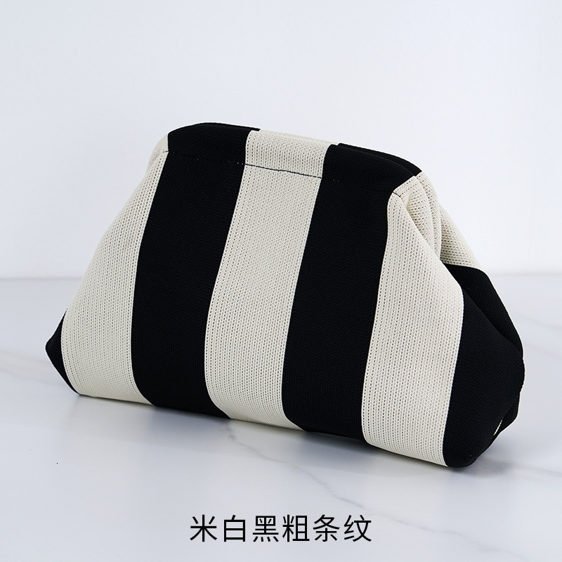 2025 New Outdoor Style Luxury Free Delivery Designer Bag Women's Beach Girl's Versatile Commuting Striped Cloud Bag Flying Woven Handbag