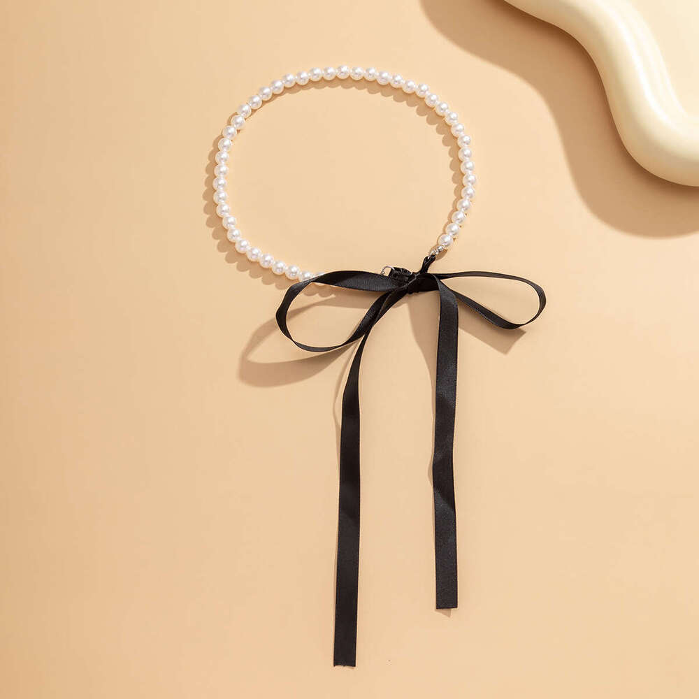 Fashionable and Temperamental Artificial Pearl Bow knot Tying Necklace Jewelry Long Bow Collar Chain Neck chain Tied Pearl Necklace for Women