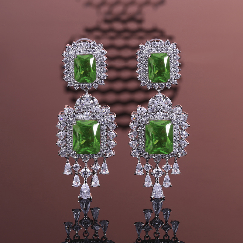 Exquisite Handcrafted Statement Pieces - Modern Artisan Crafted Hoop Studs Complemented by Vivid Colored Synthetic Stones