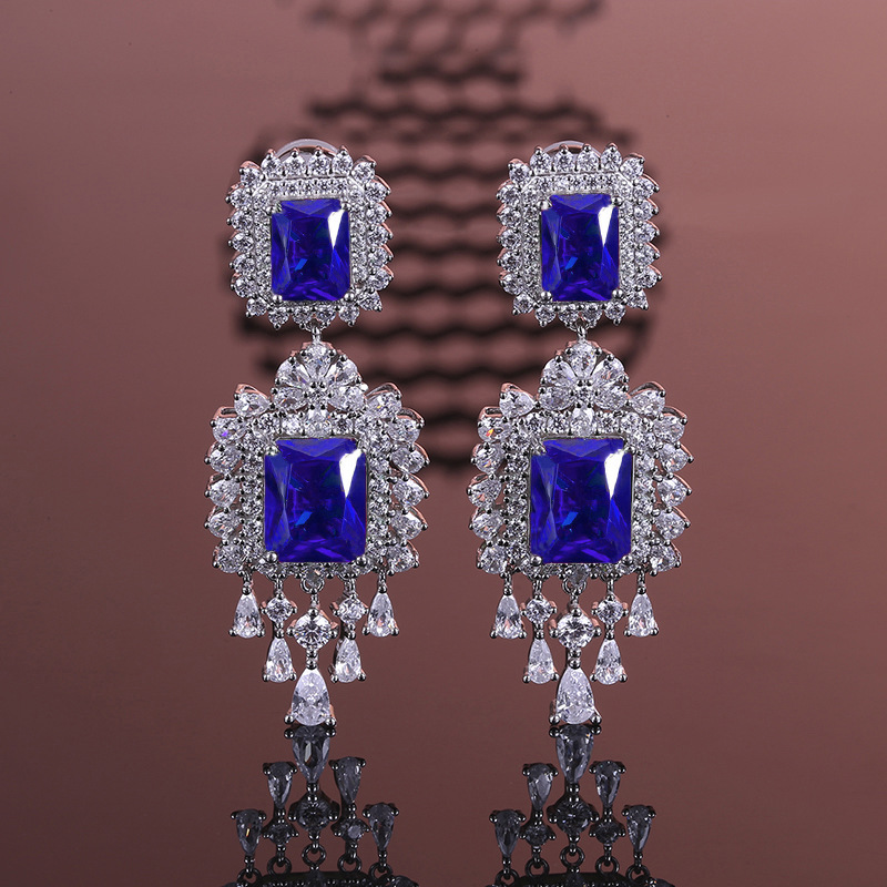 Exquisite Handcrafted Statement Pieces - Modern Artisan Crafted Hoop Studs Complemented by Vivid Colored Synthetic Stones