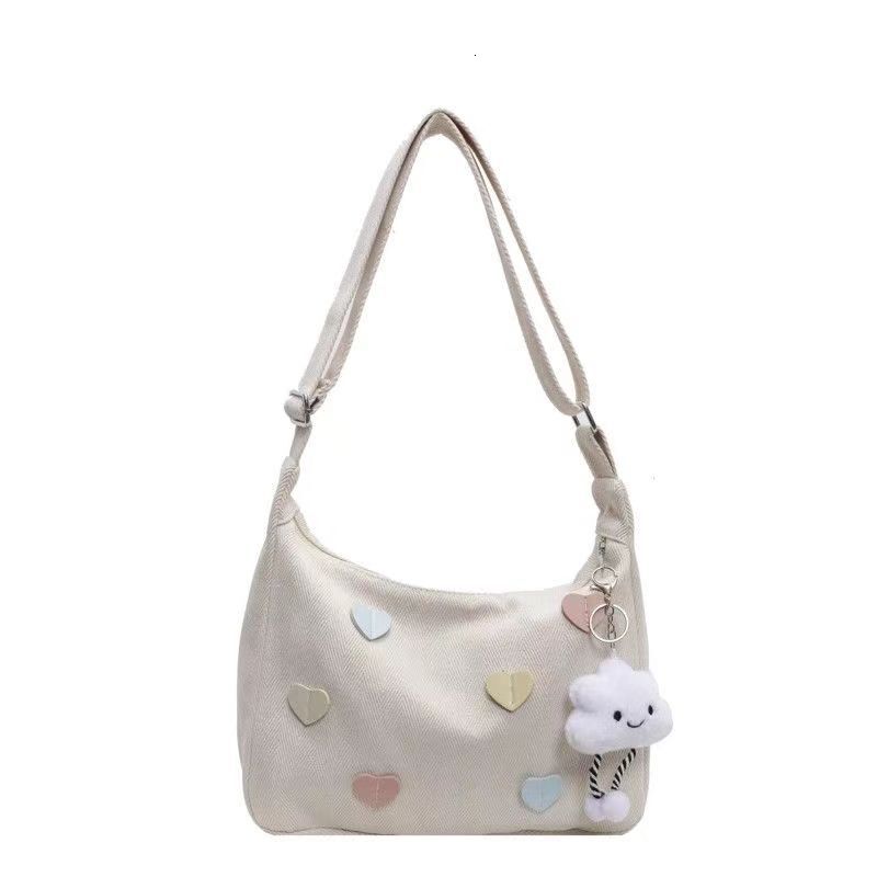 Spring new fashion slanted body large capacity commuting canvas women fashion s crossbody bag niche multifunctional fashion handbag designer shoulder 