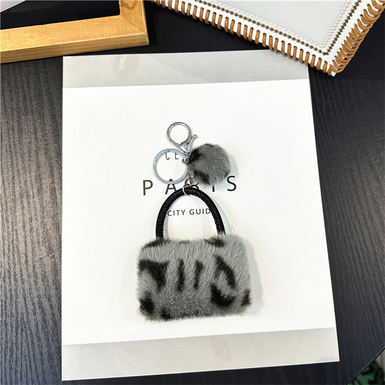 Furry Fashion Statement: Trendy Animal Patterned Purse Charm / Lanyard Attachment
