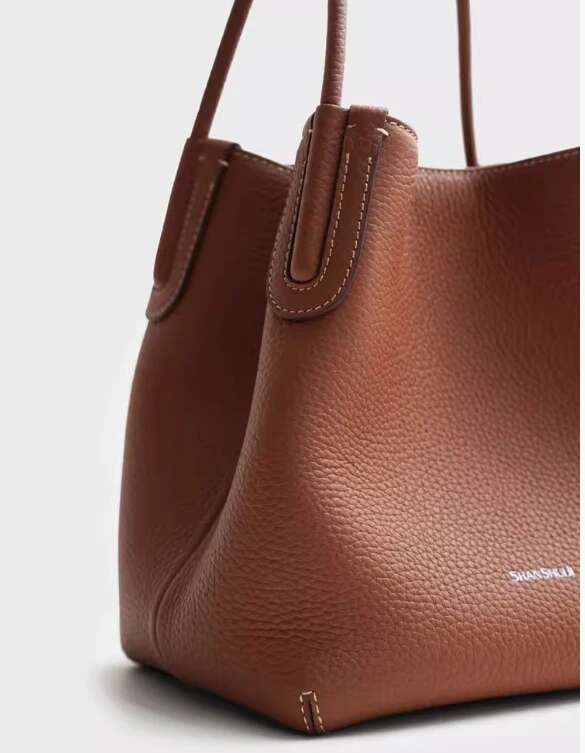Shopping basket new style single shoulder messenger high grade commuter handbag first layer cowhide women s bucket bag