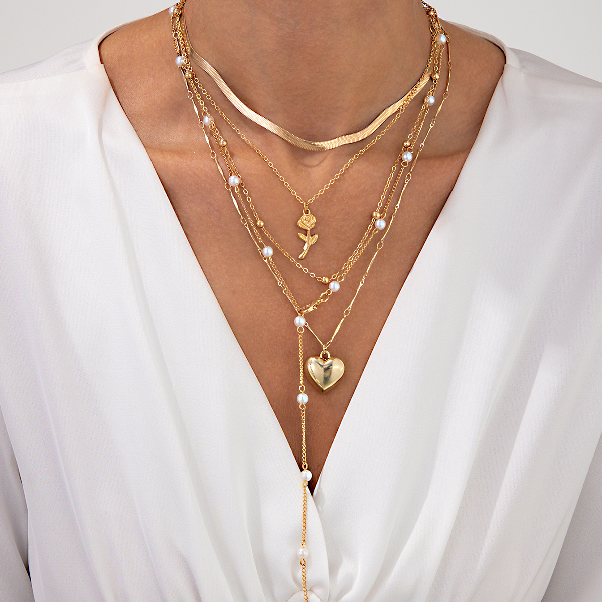 Sweet and cool ins rose heart shaped collarbone with temperament imitating pearl snake bone chain layered necklace