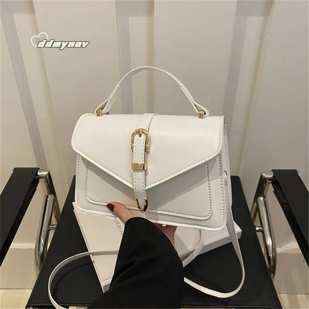 New Fashion Sling Shoulder Bag PU Top Handle Messenger Handbags Simple Solid Color Belt Buckle Commuter Crossbody Bags For Women ddmynov