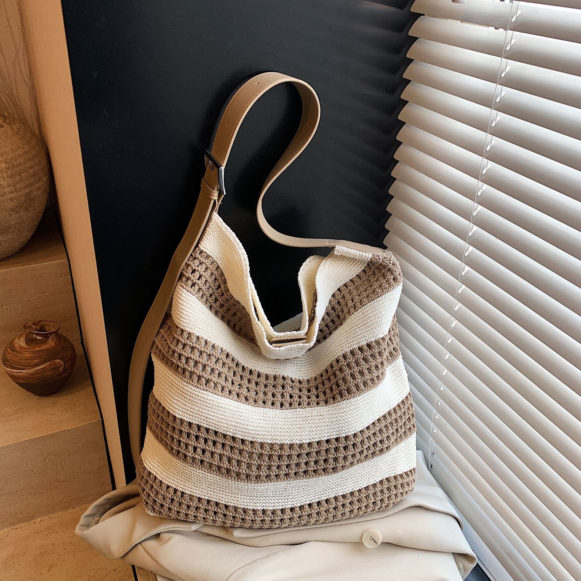 2025 Spring And Summer Striped Woven Bag Niche Design Contrast Color Striped Knitted Bag Women's Simple Hollow Hand-held Shoulder Bag
