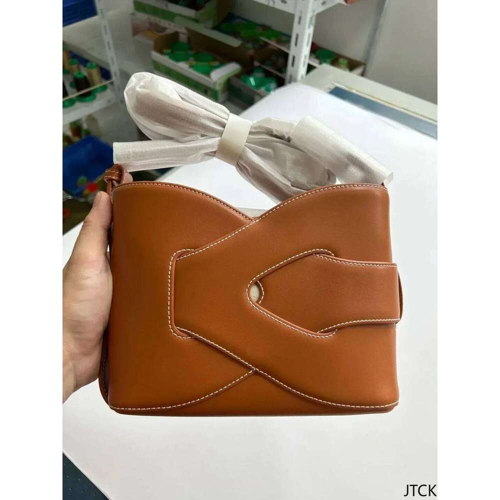 Bold Or Bust: Graphic Print Bucket Bag For The Unapologetically Extra