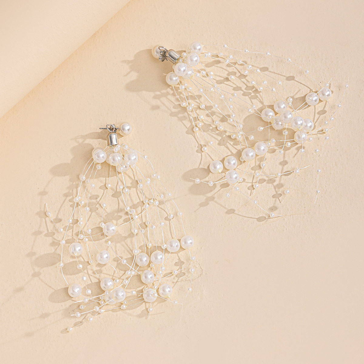 European and American Luxury Inspired Vintage Pearl Long Tassel Studs with a Celestial Style Fashion Necklace