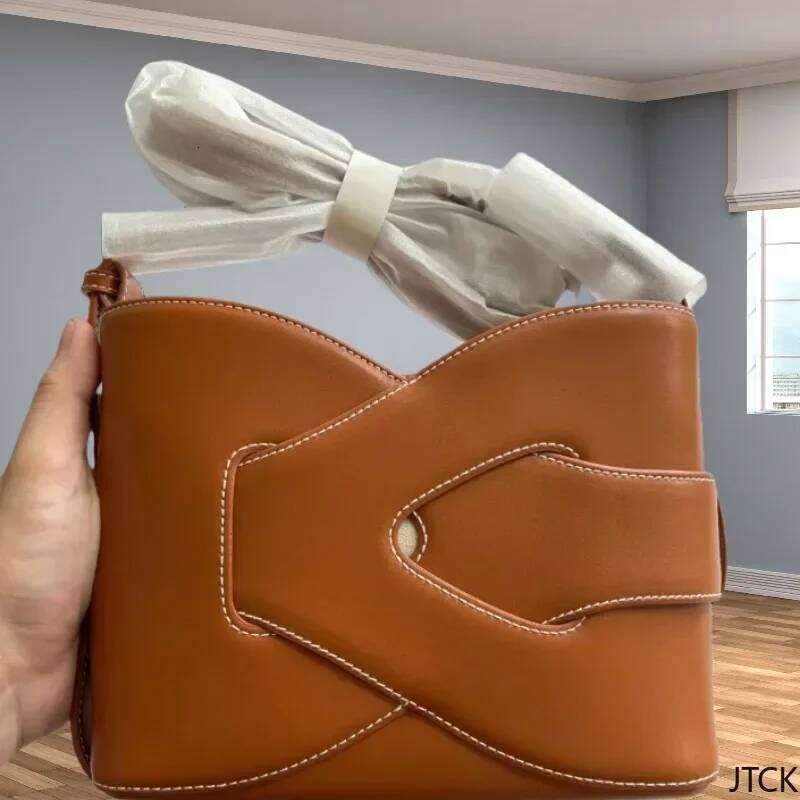 Bold Or Bust: Graphic Print Bucket Bag For The Unapologetically Extra