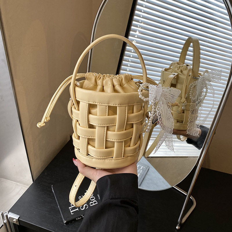 2025 Spring Summer New Niche Design Women Woven Pleated Bucket Fashion Creative Shoulder Crossbody Bag
