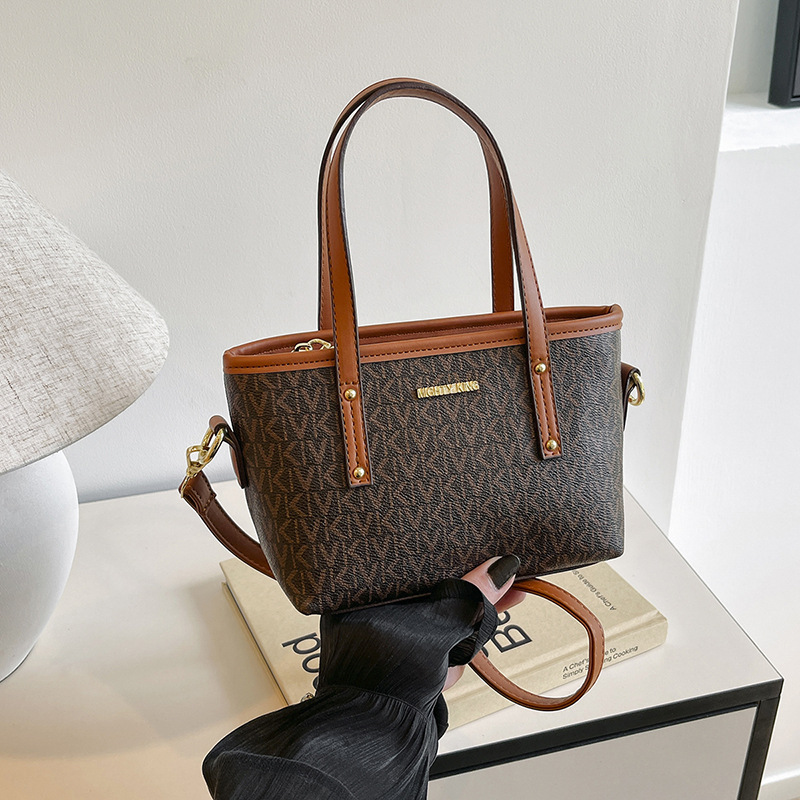 The new feeling prints the vegetable basket female bag popular crossbody bag fashionable commuting shoulder bag