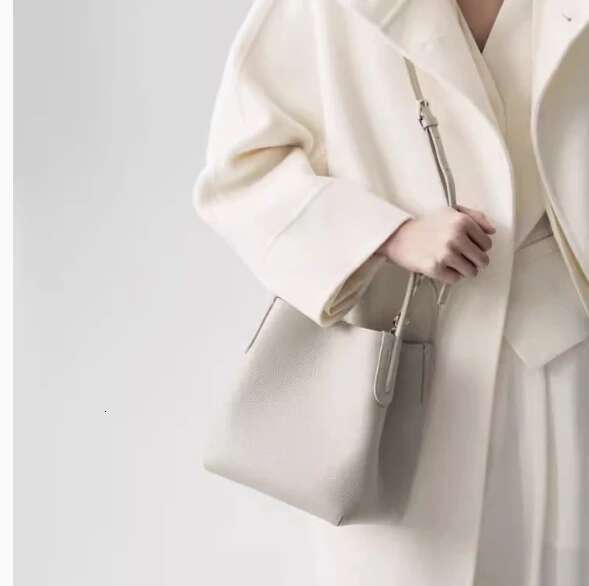 Shopping basket new style single shoulder messenger high grade commuter handbag first layer cowhide women s bucket bag