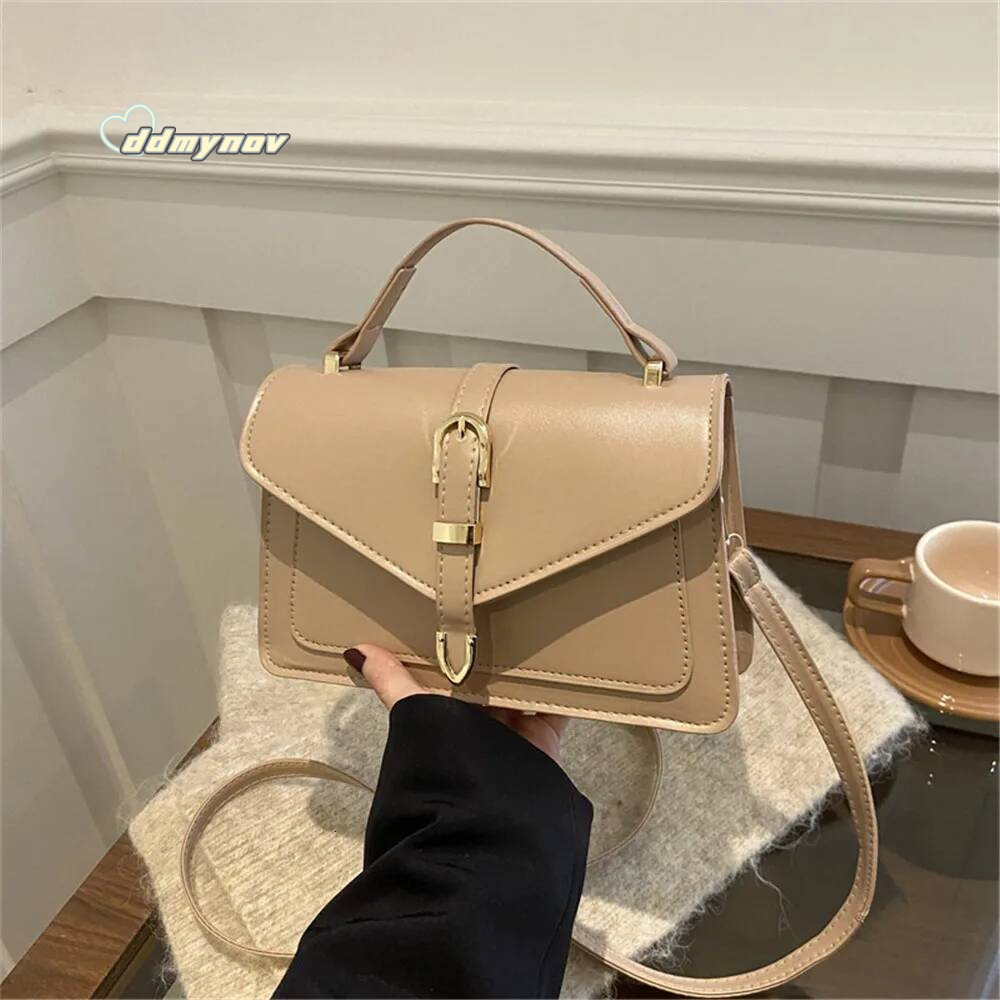 New Fashion Sling Shoulder Bag PU Top Handle Messenger Handbags Simple Solid Color Belt Buckle Commuter Crossbody Bags For Women ddmynov