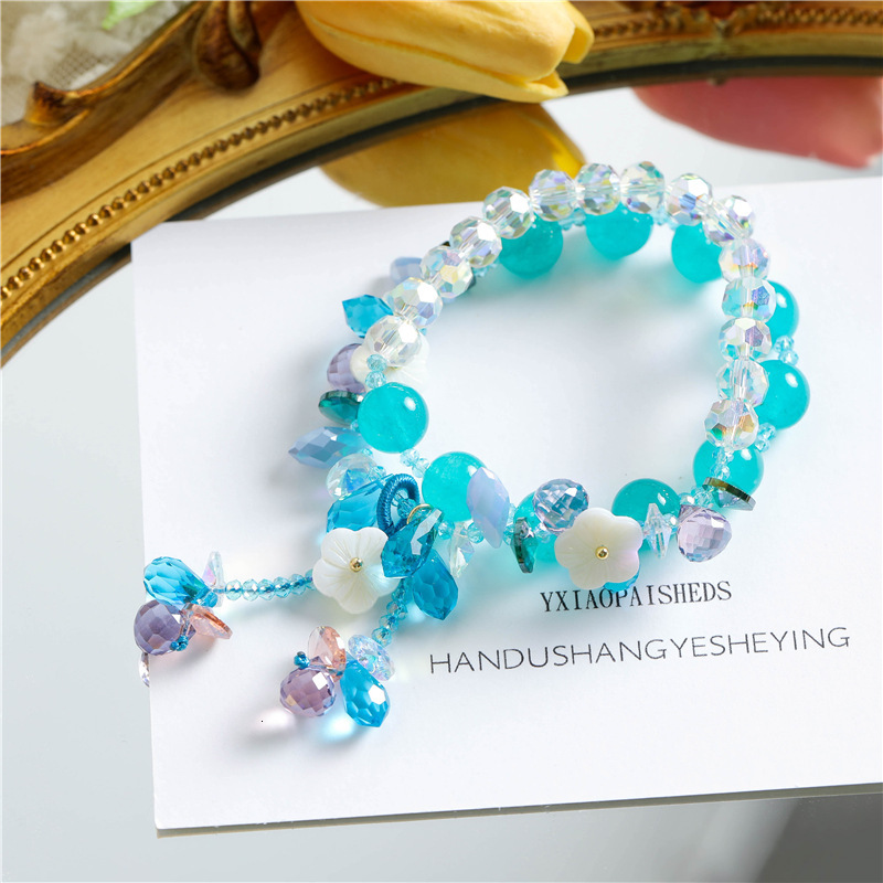 New pearl crystal women's temperament bracelet, fashionable geometric pendant, adjustable elasticity, shell electroplating bracelet